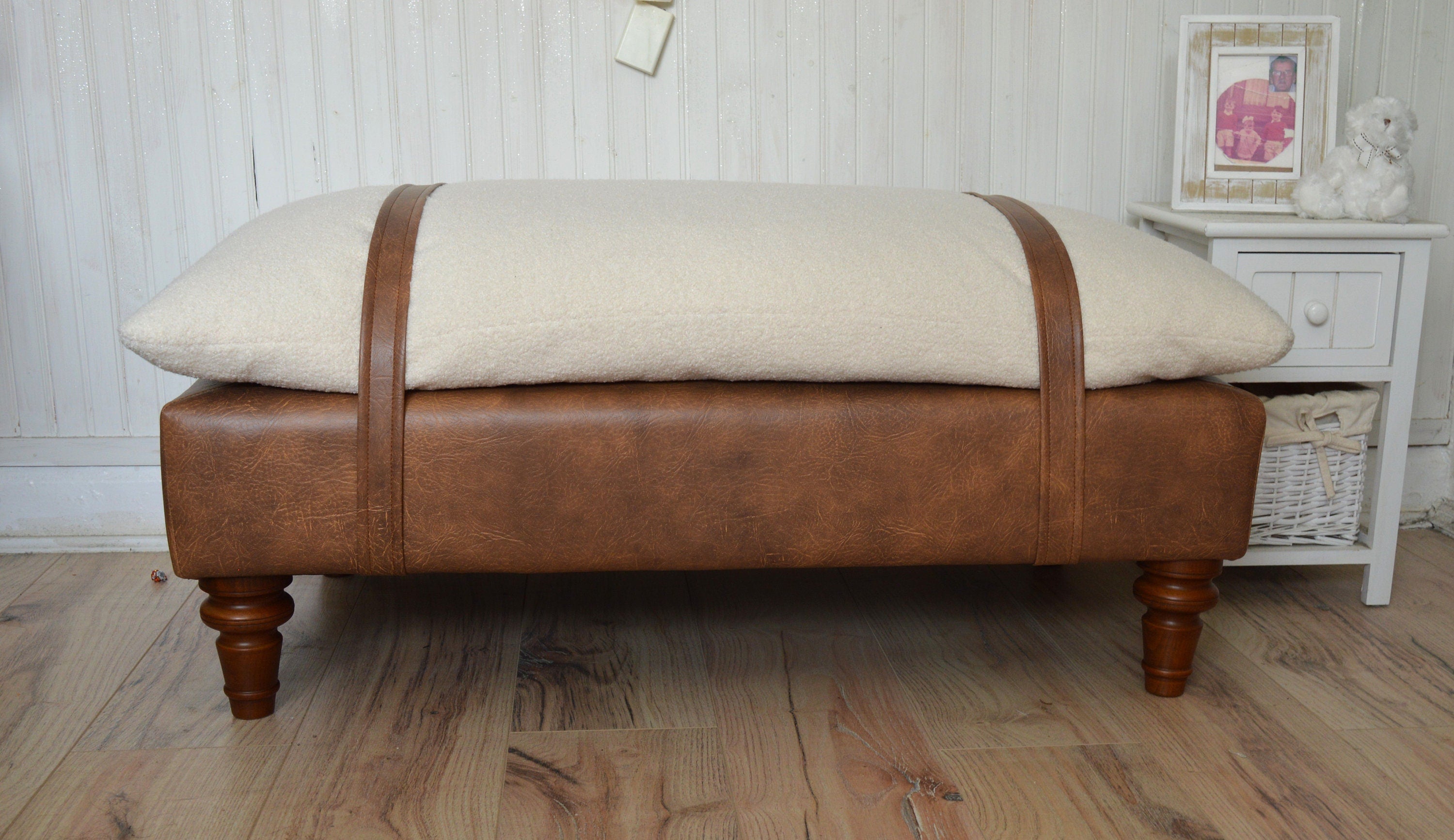 Mayfair Footstool  in Ivory Boucle Fabric And Premium Tan Faux Leather With Dark Oak Legs.