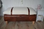 Mayfair Ottoman Footstool With Storage in Ivory Boucle Fabric With A Chestnut Faux Leather Base And Oak Turned Hardwood Legs