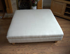 Extra Large Flat Top Footstool in 100% Danila White Sand  linen With Oak Legs Size is 100CM X 100CM