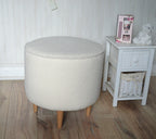 Circular round footstool upholstered in Ivory Boucle Fabric With Natural Hardwood  Legs