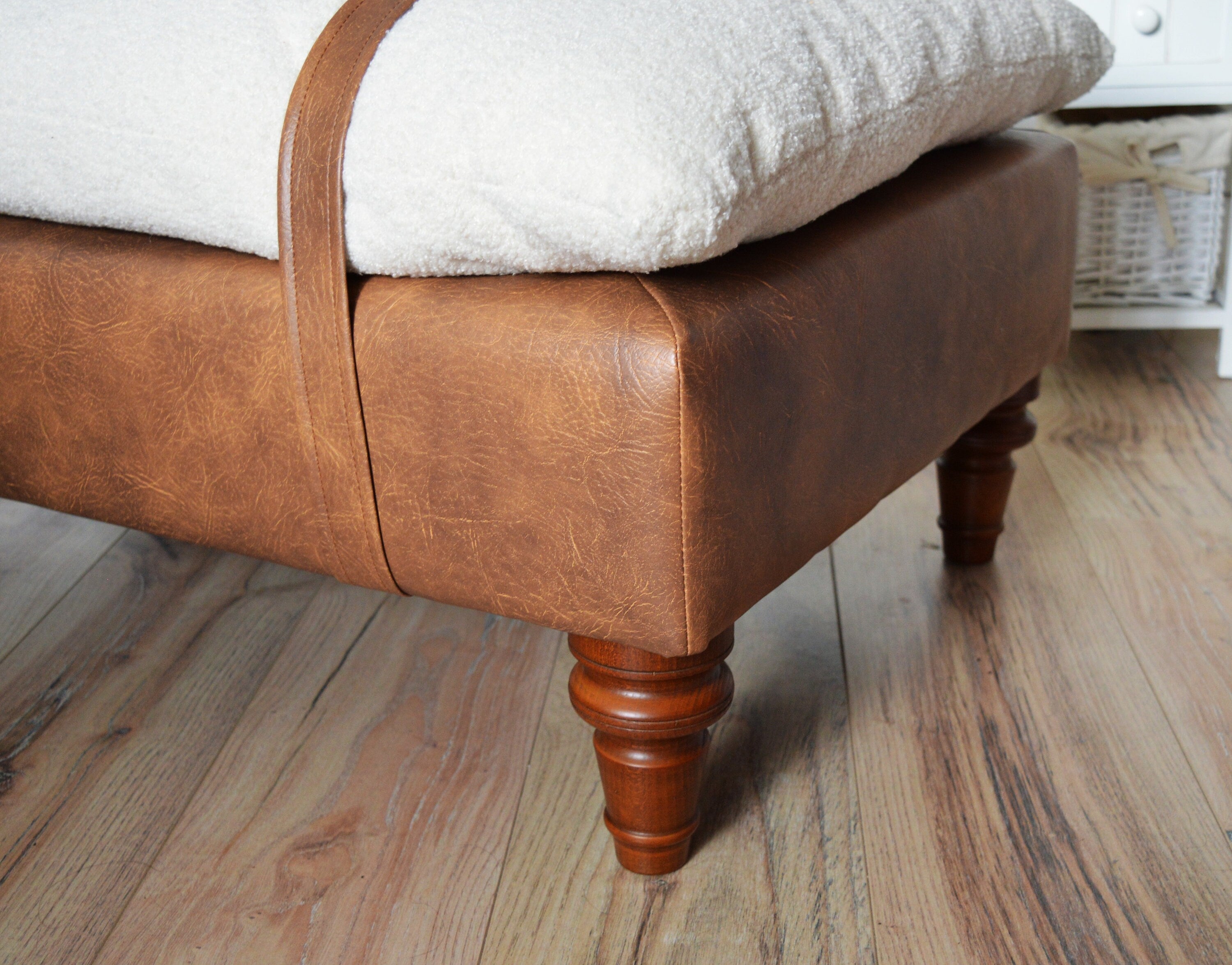 Mayfair Footstool  in Ivory Boucle Fabric And Premium Tan Faux Leather With Dark Oak Legs.