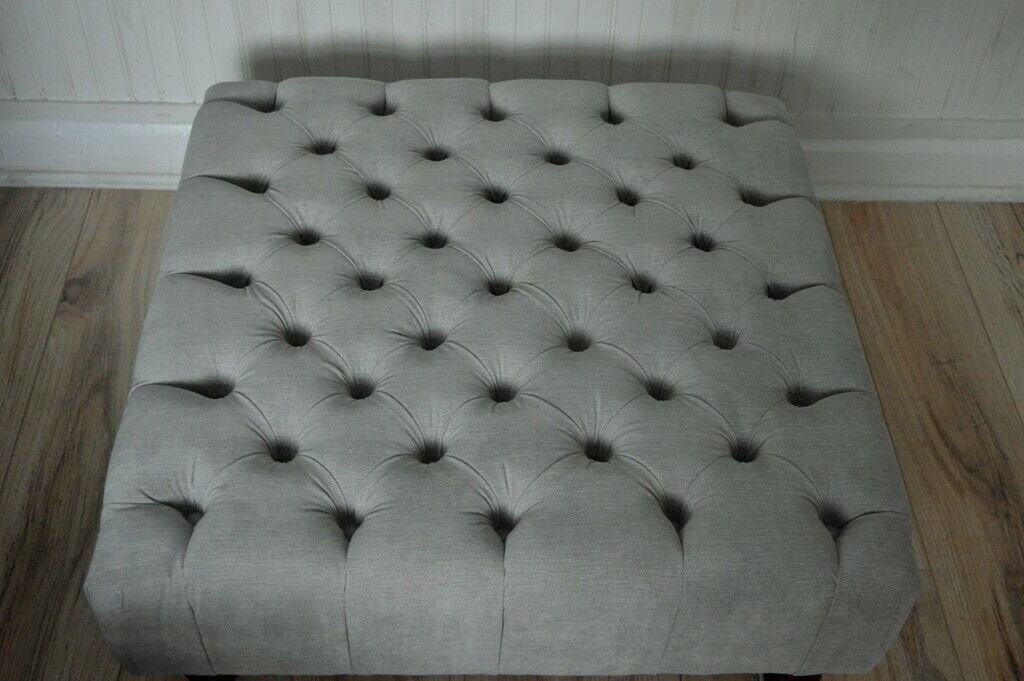 Square Chesterfield Style Deep Buttoned Footstool in Casino Silver Fabric With Turned Hard Wood Legs