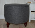 Circular round footstool upholstered in Warwick Rouen Charcoal Fabric With Turned Mahogany Hardwood  Legs