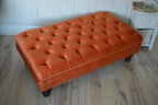 Chesterfield Deep Buttoned Footstool in Orange Velvet With Mahogany Turned Hard Wood Legs