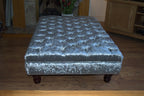 Chesterfield Extra Large Deep Buttoned Footstool in a Premium Crushed Silver Velvet With Turned Mahogany Hardwood Legs