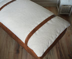Mayfair Footstool  in Ivory Boucle Fabric And Premium Tan Faux Leather With Dark Oak Legs.